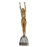 D.H Chiparus - Egyptian Dancer - A bronze study of a naked woman with arms raised aloft wearing an