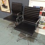 After Charles Eames - A pair of contemporary office chairs based on the Aluminium group EA108 with