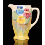 Clarice Cliff - Delecia Pansies - An Athens shape jug circa 1932, hand painted with a band of