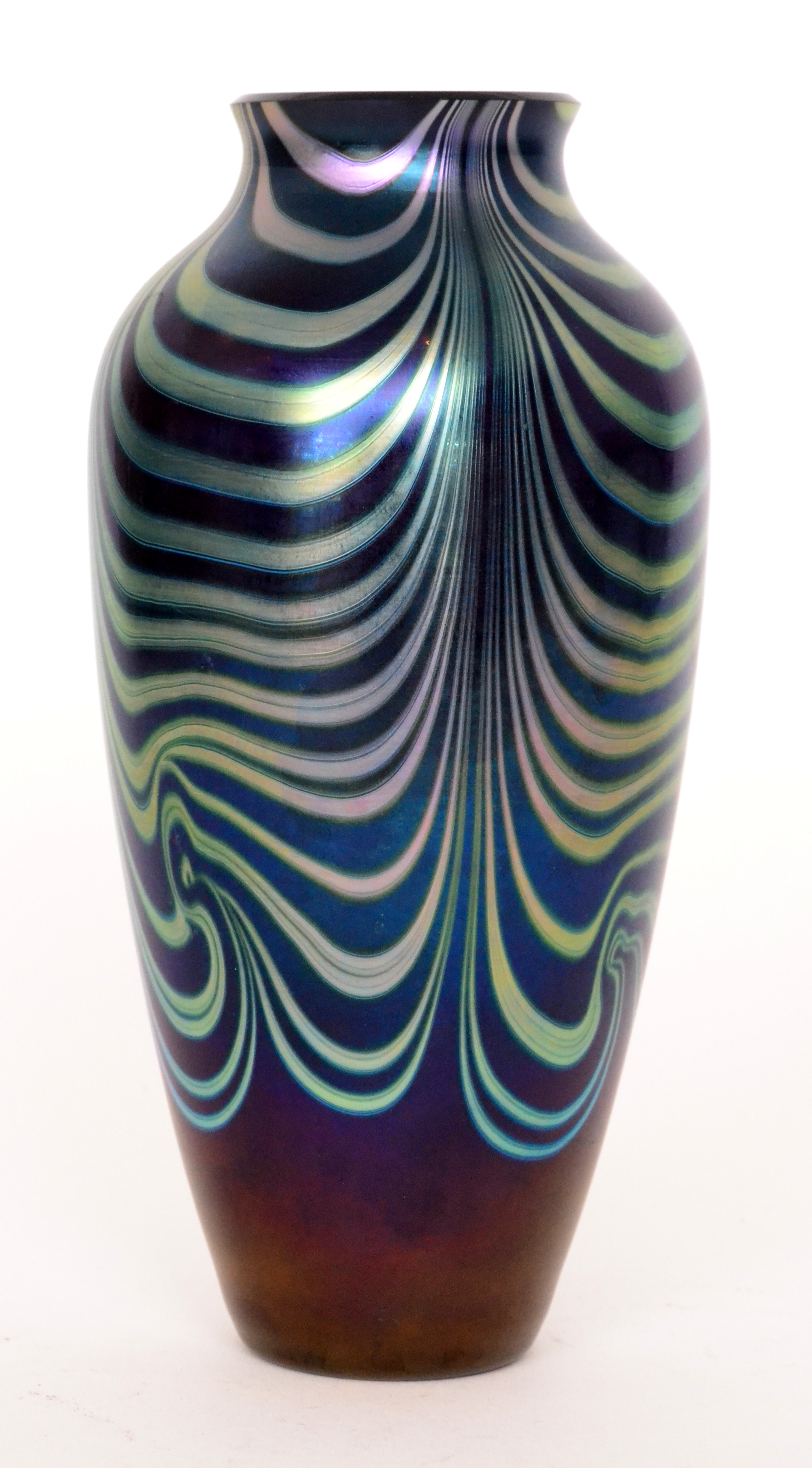 Okra - A studio glass vase of baluster form, the dark blue petrol iridescent ground with silver