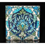 William de Morgan - Merton Abbey - A 6in plastic clay tile decorated with a stylised Persian /