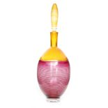 Bob Crooks - A contemporary Spirale incalmo glass decanter of footed ovoid form with collar neck