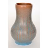 Pilkington's Royal Lancastrian - A 1930s vase of globe and shaft form decorated with a tonal blue