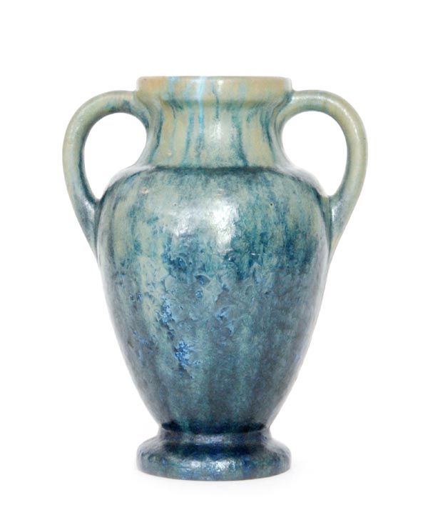 Pierrefonds - An early 20th Century twin handled vase of footed baluster form,