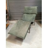 Unknown - A late 20th Century green leather upholstered chaise or day bed on tubular frame, length
