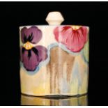 Clarice Cliff - Delecia Pansies - A drum preserve circa 1932, hand painted with stylised flowers
