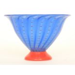 Orrefors - A contemporary glass bowl of circular form decorated with red dash lines over a striped