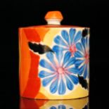 Clarice Cliff - Orange Ribbon - A drum preserve circa 1932, hand painted with stylised flowers and