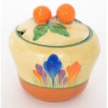 Clarice Cliff - Crocus - A small preserve pot and cover circa 1930, hand painted with Crocus sprays