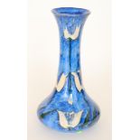 Anita Harris - Cobridge - A large vase of globe and shaft form decorated with a streaked blue,