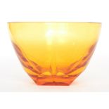 William Wilson - Whitefriars - A Golden Amber glass bowl, the square base with four circles leading