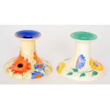 Grays Pottery - A candlestick of shallow circular form hand painted with stylised flowers and