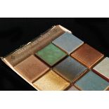 Malkin Tile Works Co - A set of nine 3in Malkin Art Glazes dust pressed tiles mounted to the