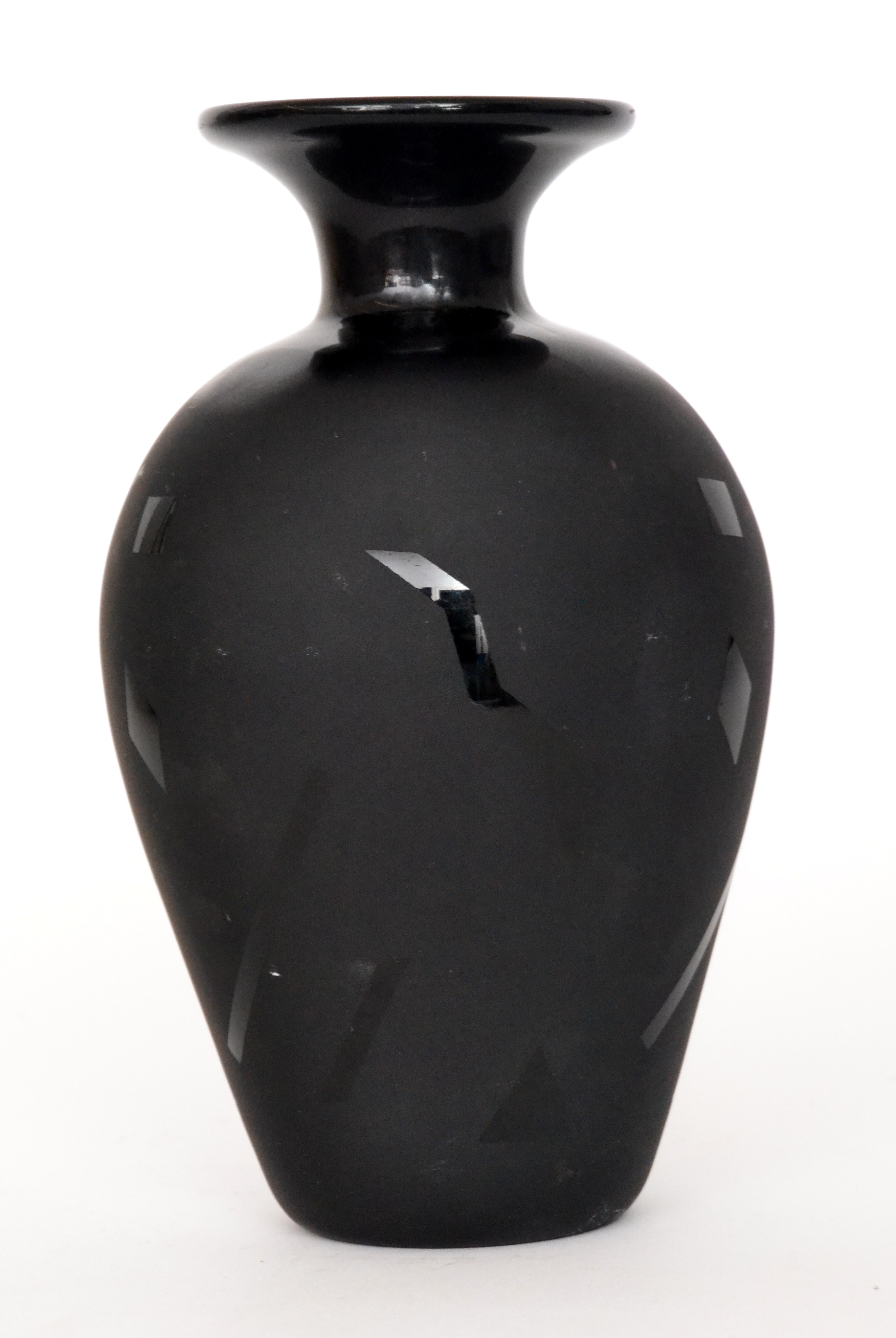 Unknown - A contemporary studio glass vase of swollen form, the body in matt black with acid cut