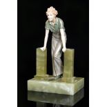 Ferdinand Preiss - The Stile - A bronze and ivory figure of a standing woman leaning forward with