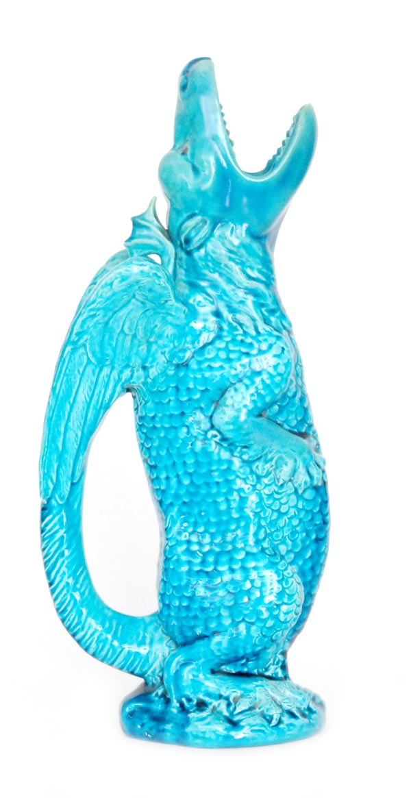 Burmanofts - A large late 19th Century jug modelled as a grotesque blue glazed dragon,