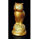 Zsolnay Pecs - An eosin glaze model of an owl perched on a rock, red printed mark, height 7.5cm