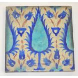 Pilkington's - An early 20th Century 8in plastic clay tile decorated with a Persian design of