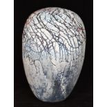 Peter Layton - A contemporary studio glass vase of ovoid form with narrow neck decorated in the