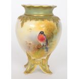 A Royal Worcester bombe shaped vase raised to four splayed feet panel painted with a bullfinch