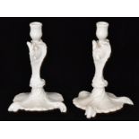 A pair of 19th Century Berlin blanc de chine candlesticks,