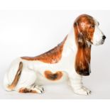 A large Italian post-war model of a Basset hound with hand painted detailing, painted marks Italy,