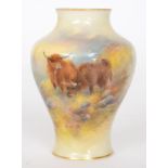 A Royal Worcester baluster vase decorated by H.