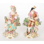 A pair of late 18th Century Derby figurines of musicians,