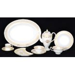 An extensive Wedgwood Coronation Golden Persephone pattern dinner service,