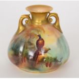 A Royal Worcester twin handled squat vase of melon form decorated by A.