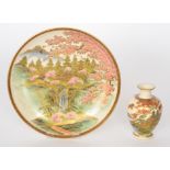 A 19th Century Satsuma plate decorated with a Chinoiserie landscape with pagodas and blossom trees