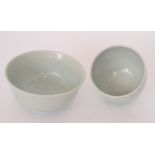 Two studio pottery bowls by Derek Clarkson each decorated in an all over celadon glaze with