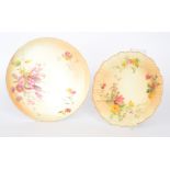 A Royal Worcester blush ivory shallow plate decorated with hand painted and transfer fuchsia and