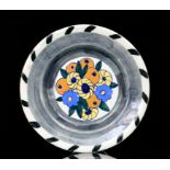 An early 20th Century cabinet plate hand painted to the central roundel with stylised fruit and