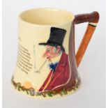 A Crown Devon Fieldings John Peel musical tankard decorated with a relief moulded portrait and