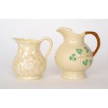 A Belleek third period jug of footed spherical form,