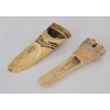 A 19th Century bone whistle possibly of a stocking leg, 8cm,