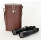 A pair of Lieberman and Gortz 35 x 60 black cased binoculars with brown carrying case and shoulder