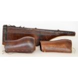 An early 20th Century brown leather leg of mutton shotgun case, width 81cm,