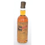 A bottle of White Horse blended scotch whisky No 1369531 with original paper label distilled and
