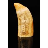 A 19th Century scrimshaw marine tooth, possibly whale,