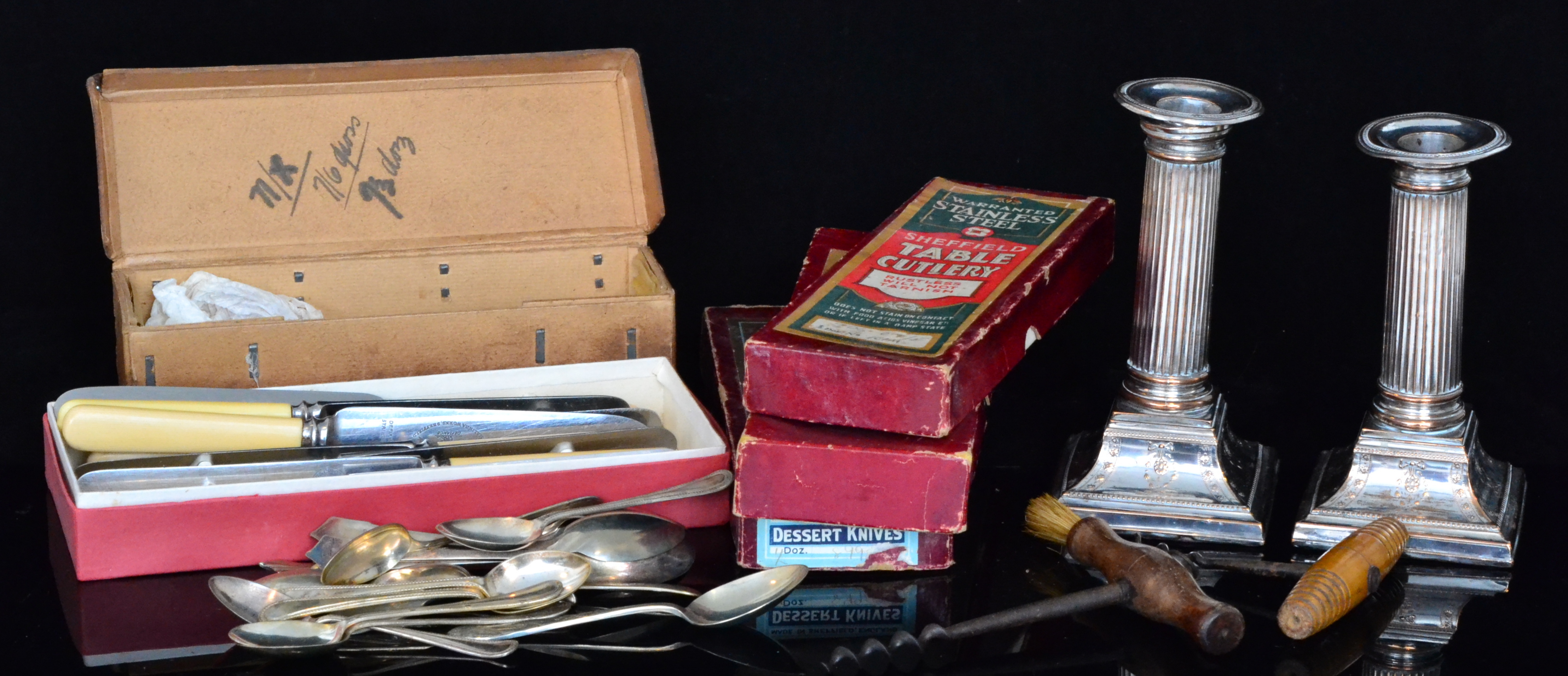 A small parcel lot of assorted boxed and unboxed silver plated and white metal cutlery,