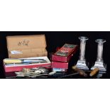 A small parcel lot of assorted boxed and unboxed silver plated and white metal cutlery,