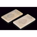Two late 19th to early 20th Century carved ivory card cases of rectangular form,