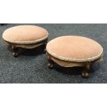 A pair of late 19th to early 20th Century mahogany framed circular footstools,