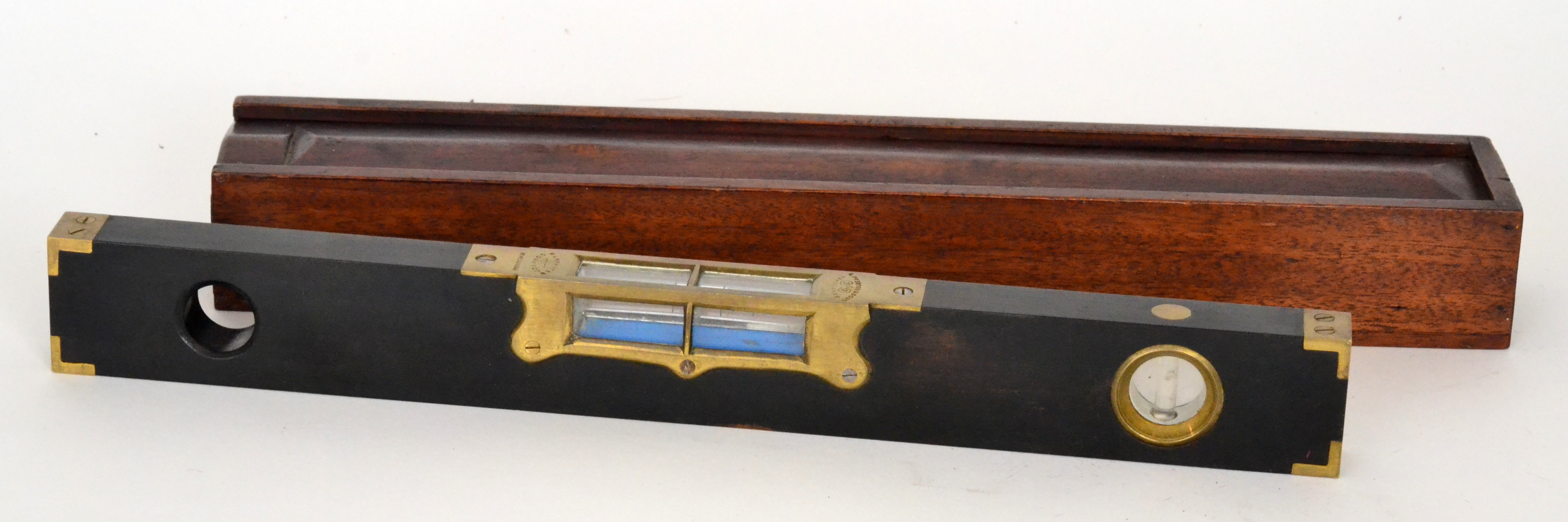 A 19th Century carpenters ebonised and brass fitted level by L Preston and Sons No 269393,