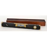 A 19th Century carpenters ebonised and brass fitted level by L Preston and Sons No 269393,