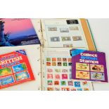 A GB and world stamp collection contained in various albums together with first day covers and