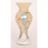 A small later 20th Century Okra glass vase of slender baluster form decorated in a variation of the