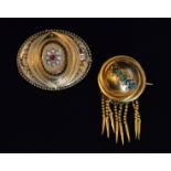 A Victorian 9ct Etruscan style brooch,